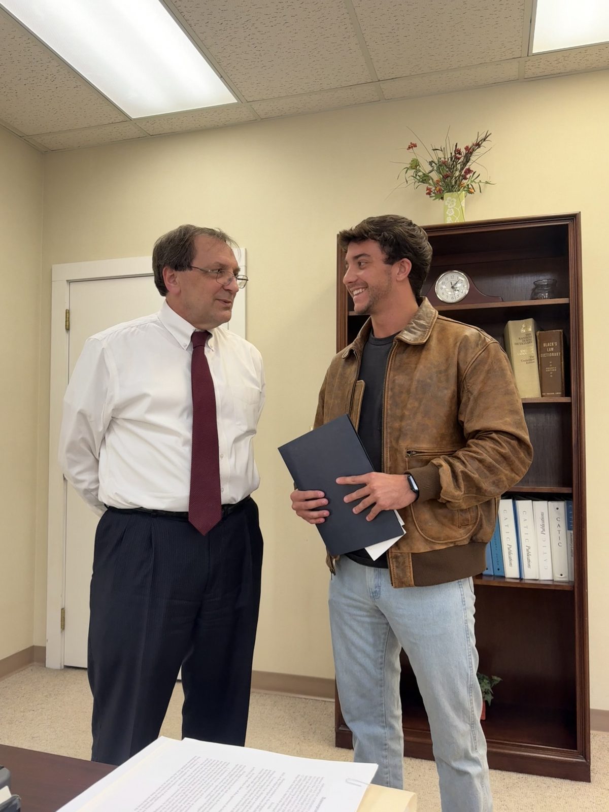 Luther Odom in an office meeting